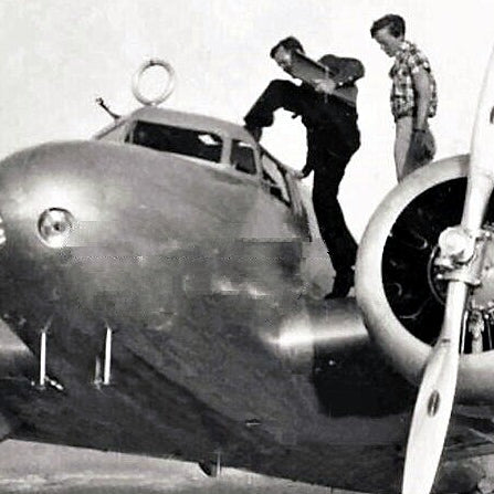Noonan and Earhart board the Lockheed Electra